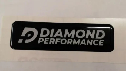 Diamond Performance logo domed sticker in white writing